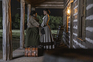 Joaquina Kalukango as Esme and Lauren E Banks as Jennie Reeves in Lawmen: Bass Reeves, episode 7, season 1, streaming on Paramount+, 2023. Photo Credit: Lauren Smith/Paramount+